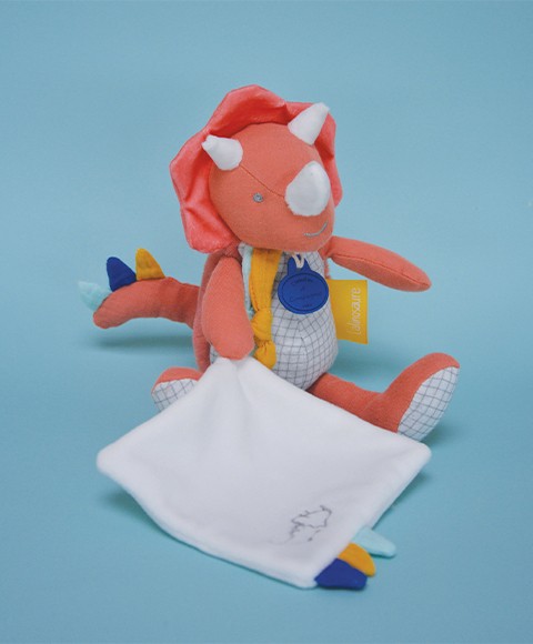 peluche dinosaure orange avec mouchoir