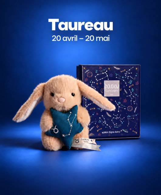 Peluche lapin Doudou Astro Taureau beige tenant une étoile bleue brodée de la constellation, avec étiquette du signe.