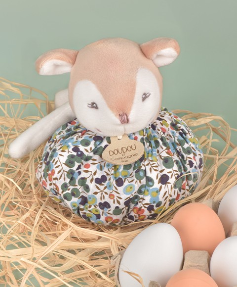 doudou renne marron se transformant en boule au motif végétal