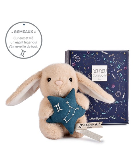 Peluche lapin Doudou Astro Bélier beige tenant une étoile bleue brodée de la constellation, avec étiquette du signe, sur fond blanc.